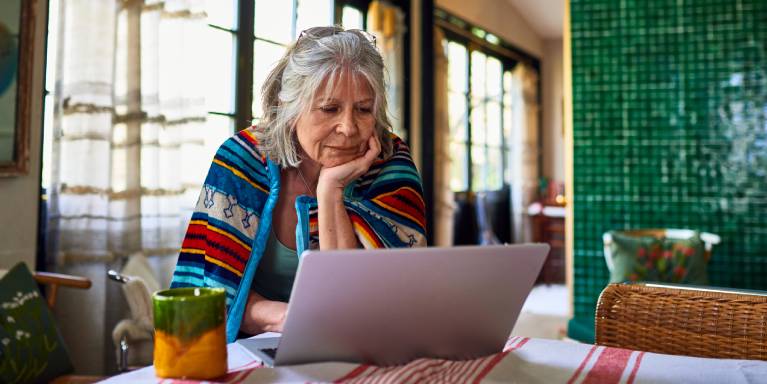 Older lady looking at laptop