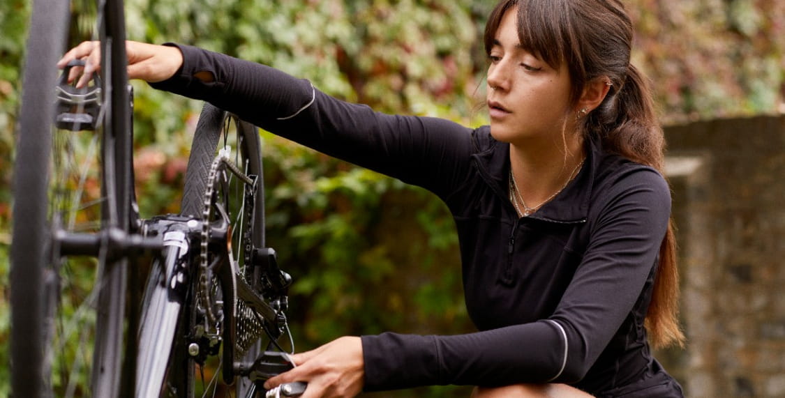 Person fixing bike