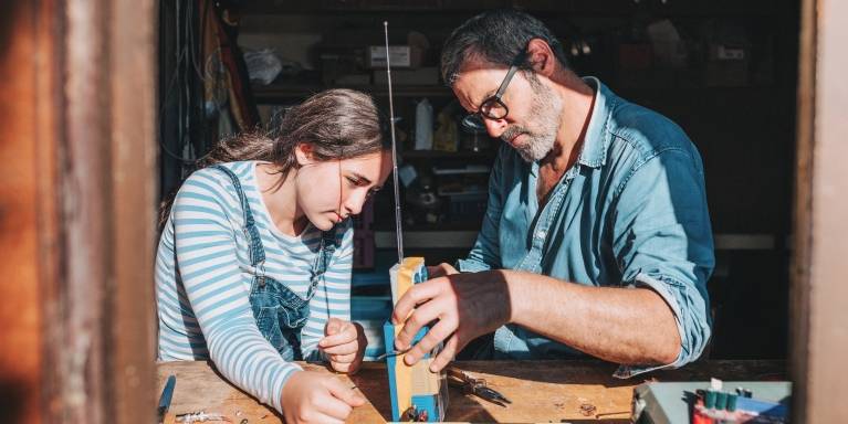 Man and girl doing DIY